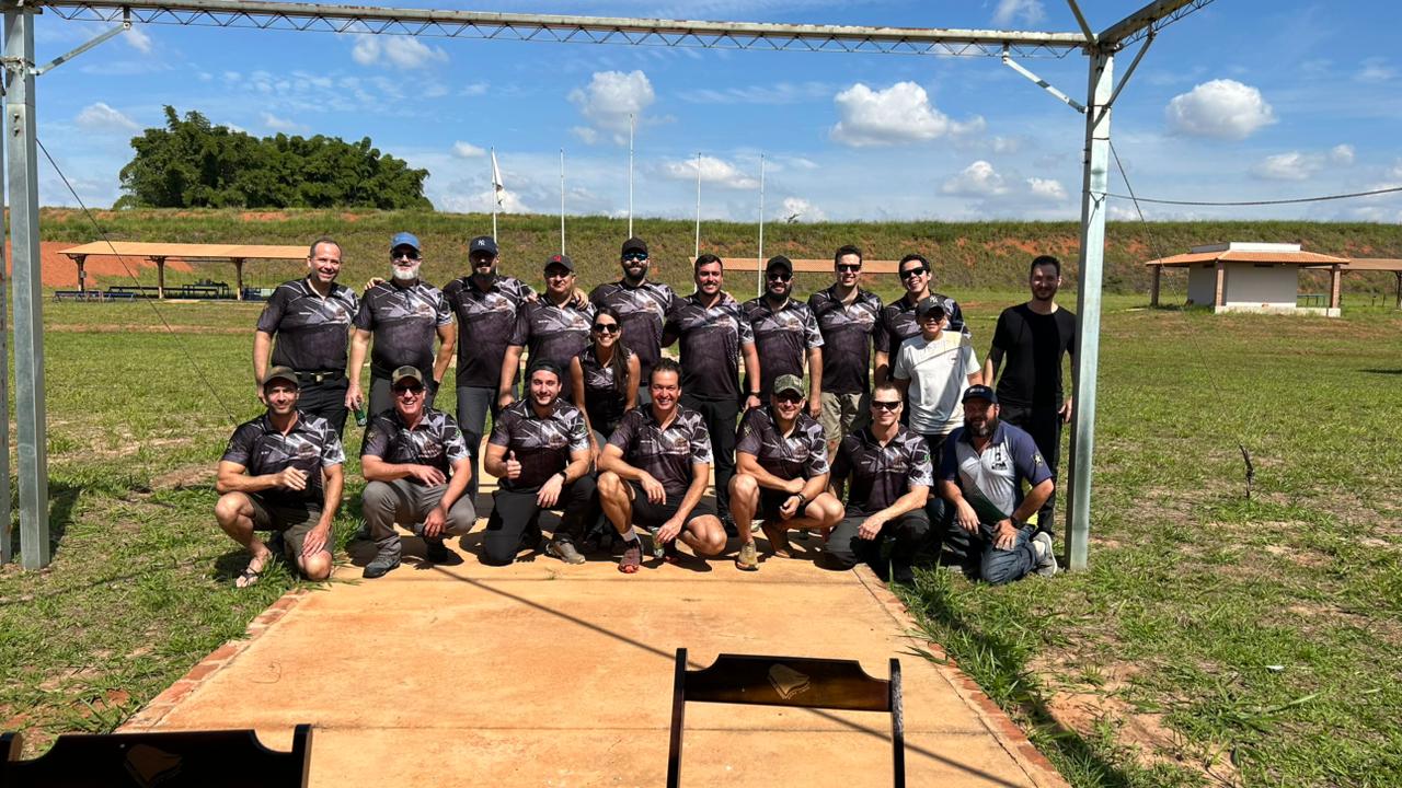 black semi automatic pistol on green and white textile